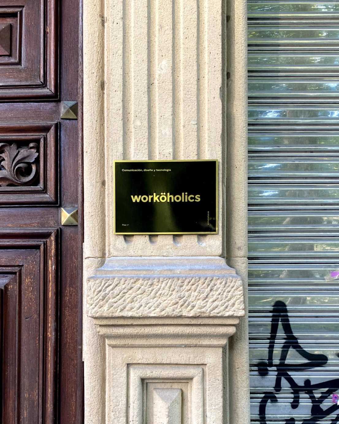 Worköholics entrance plaque